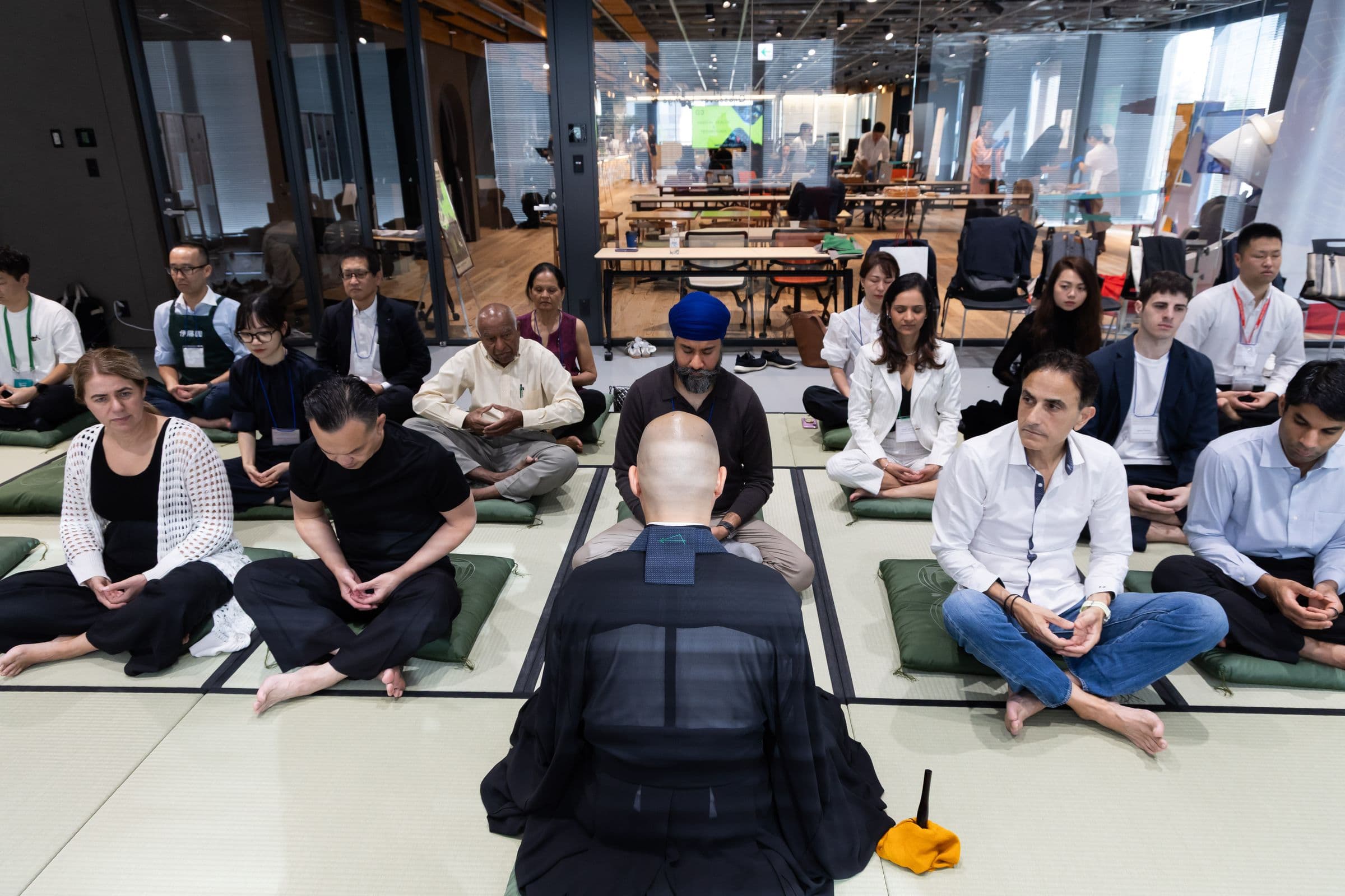 Attendees seated on tatami during morning zazen